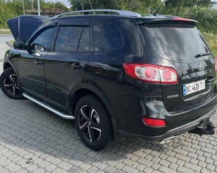Черный Хендай Санта Фе, объемом двигателя 2 л и пробегом 265 тыс. км за 12200 $, фото 1 на Automoto.ua