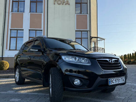 Чорний Хендай Санта Фе, об'ємом двигуна 2.4 л та пробігом 255 тис. км за 8999 $, фото 1 на Automoto.ua