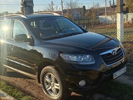 Черный Хендай Санта Фе, объемом двигателя 2.36 л и пробегом 191 тыс. км за 11500 $, фото 1 на Automoto.ua