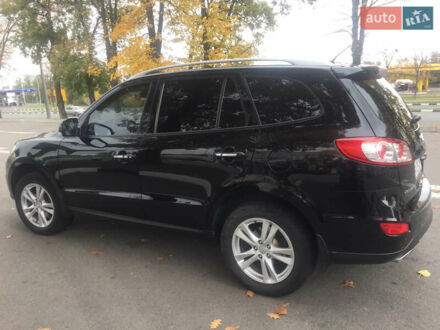 Черный Хендай Санта Фе, объемом двигателя 2.36 л и пробегом 147 тыс. км за 14000 $, фото 1 на Automoto.ua