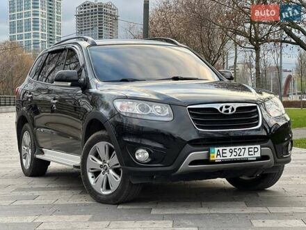 Черный Хендай Санта Фе, объемом двигателя 2.36 л и пробегом 131 тыс. км за 12800 $, фото 1 на Automoto.ua