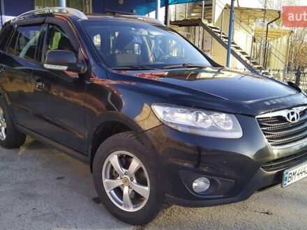 Черный Хендай Санта Фе, объемом двигателя 2.4 л и пробегом 195 тыс. км за 11250 $, фото 1 на Automoto.ua