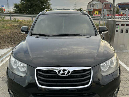 Черный Хендай Санта Фе, объемом двигателя 2.2 л и пробегом 320 тыс. км за 14500 $, фото 1 на Automoto.ua
