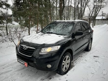 Черный Хендай Санта Фе, объемом двигателя 2.4 л и пробегом 224 тыс. км за 12990 $, фото 1 на Automoto.ua