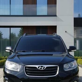 Черный Хендай Санта Фе, объемом двигателя 2.2 л и пробегом 190 тыс. км за 14950 $, фото 1 на Automoto.ua