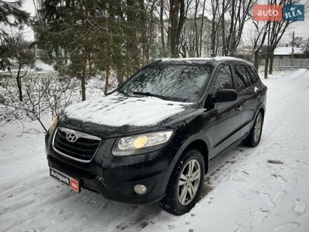 Черный Хендай Санта Фе, объемом двигателя 2.4 л и пробегом 224 тыс. км за 12990 $, фото 1 на Automoto.ua