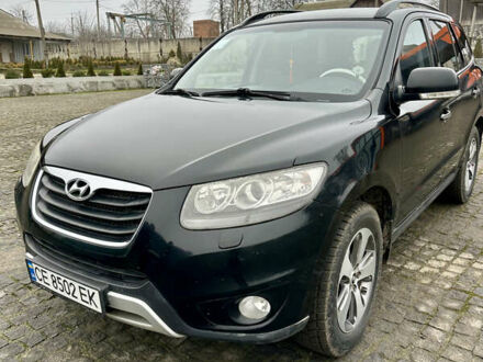 Черный Хендай Санта Фе, объемом двигателя 2.2 л и пробегом 310 тыс. км за 12900 $, фото 1 на Automoto.ua