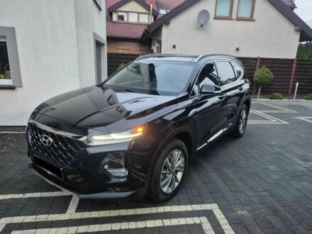 Черный Хендай Санта Фе, объемом двигателя 2.4 л и пробегом 105 тыс. км за 11200 $, фото 1 на Automoto.ua