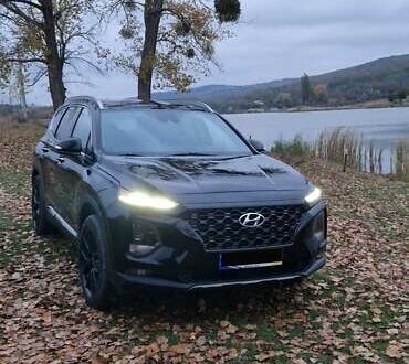 Черный Хендай Санта Фе, объемом двигателя 2.36 л и пробегом 152 тыс. км за 23700 $, фото 1 на Automoto.ua