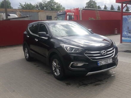 Черный Хендай Санта Фе, объемом двигателя 2.36 л и пробегом 125 тыс. км за 16700 $, фото 1 на Automoto.ua