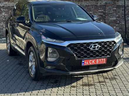 Черный Хендай Санта Фе, объемом двигателя 2.4 л и пробегом 49 тыс. км за 23000 $, фото 1 на Automoto.ua