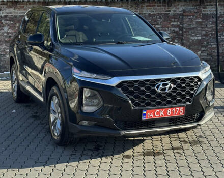 Черный Хендай Санта Фе, объемом двигателя 2.4 л и пробегом 49 тыс. км за 23000 $, фото 1 на Automoto.ua