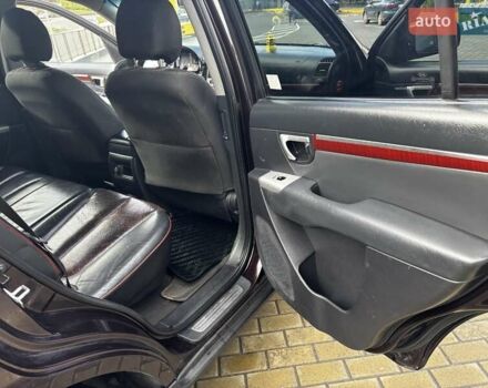 Хендай Санта Фе 2008 в Черкассах на Automoto.ua Фиолетовый Хендай Санта Фе, объемом двигателя 2.19 л и пробегом 300 тыс. км за 9188 $, фото 8 на Automoto.ua