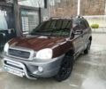 Коричневый Хендай Санта Фе, объемом двигателя 2.4 л и пробегом 270 тыс. км за 4400 $, фото 1 на Automoto.ua