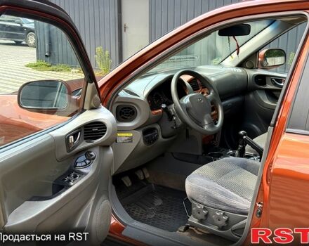 Коричневый Хендай Санта Фе, объемом двигателя 2.4 л и пробегом 142 тыс. км за 5950 $, фото 3 на Automoto.ua