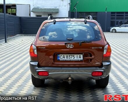 Коричневый Хендай Санта Фе, объемом двигателя 2.4 л и пробегом 142 тыс. км за 5950 $, фото 2 на Automoto.ua
