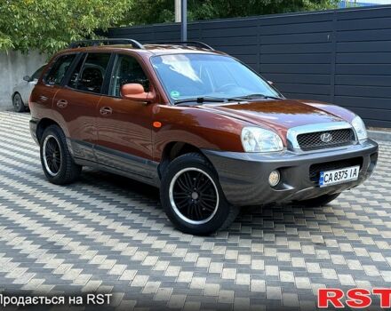 Коричневый Хендай Санта Фе, объемом двигателя 2.4 л и пробегом 142 тыс. км за 5950 $, фото 1 на Automoto.ua