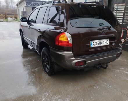 Коричневый Хендай Санта Фе, объемом двигателя 2.4 л и пробегом 270 тыс. км за 4400 $, фото 2 на Automoto.ua