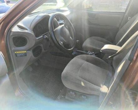 Коричневый Хендай Санта Фе, объемом двигателя 2 л и пробегом 220 тыс. км за 3000 $, фото 5 на Automoto.ua