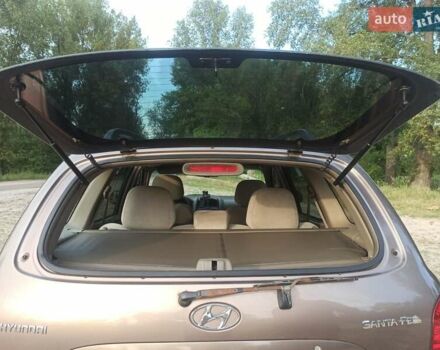 Коричневый Хендай Санта Фе, объемом двигателя 2 л и пробегом 258 тыс. км за 6500 $, фото 5 на Automoto.ua