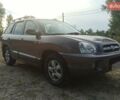 Коричневый Хендай Санта Фе, объемом двигателя 2 л и пробегом 258 тыс. км за 6500 $, фото 2 на Automoto.ua