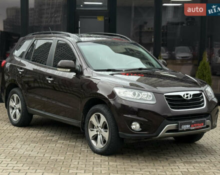 Коричневый Хендай Санта Фе, объемом двигателя 2.36 л и пробегом 195 тыс. км за 11900 $, фото 3 на Automoto.ua