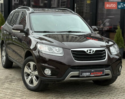 Коричневый Хендай Санта Фе, объемом двигателя 2.36 л и пробегом 195 тыс. км за 11900 $, фото 1 на Automoto.ua