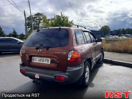 Коричневый Хендай Санта Фе, объемом двигателя 2.4 л и пробегом 250 тыс. км за 4999 $, фото 1 на Automoto.ua