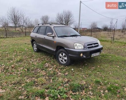 Коричневый Хендай Санта Фе, объемом двигателя 2.7 л и пробегом 298 тыс. км за 5300 $, фото 1 на Automoto.ua