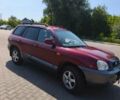 Червоний Хендай Санта Фе, об'ємом двигуна 2.7 л та пробігом 228 тис. км за 3500 $, фото 5 на Automoto.ua