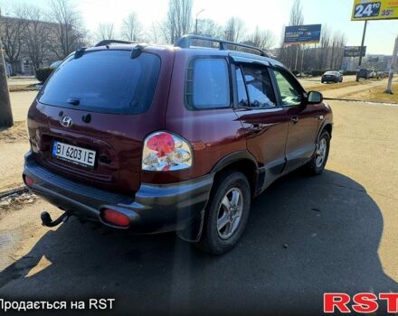 Красный Хендай Санта Фе, объемом двигателя 2 л и пробегом 280 тыс. км за 6200 $, фото 3 на Automoto.ua
