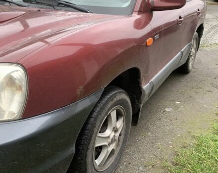 Красный Хендай Санта Фе, объемом двигателя 2 л и пробегом 400 тыс. км за 3300 $, фото 2 на Automoto.ua