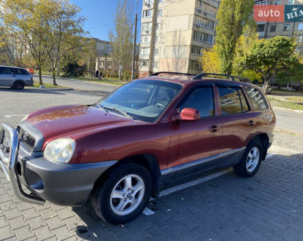 Красный Хендай Санта Фе, объемом двигателя 2.4 л и пробегом 256 тыс. км за 4000 $, фото 2 на Automoto.ua