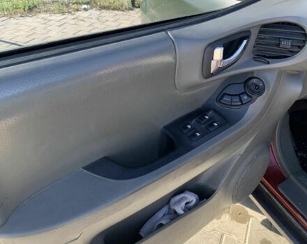 Красный Хендай Санта Фе, объемом двигателя 2.4 л и пробегом 267 тыс. км за 3200 $, фото 8 на Automoto.ua