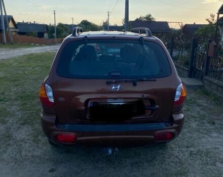 Красный Хендай Санта Фе, объемом двигателя 2 л и пробегом 320 тыс. км за 2300 $, фото 5 на Automoto.ua