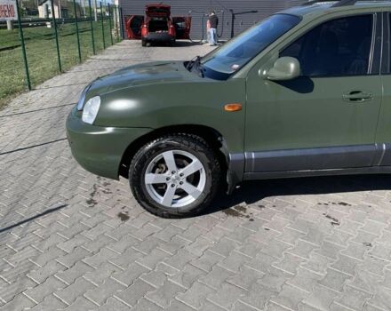 Красный Хендай Санта Фе, объемом двигателя 2.4 л и пробегом 267 тыс. км за 3200 $, фото 1 на Automoto.ua