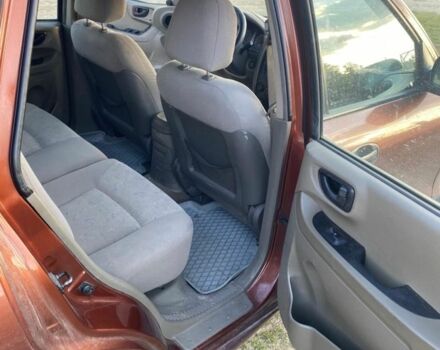 Красный Хендай Санта Фе, объемом двигателя 2 л и пробегом 320 тыс. км за 2300 $, фото 8 на Automoto.ua