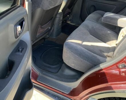 Красный Хендай Санта Фе, объемом двигателя 2.4 л и пробегом 267 тыс. км за 3200 $, фото 4 на Automoto.ua