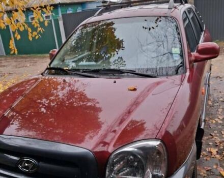 Красный Хендай Санта Фе, объемом двигателя 2 л и пробегом 120 тыс. км за 8500 $, фото 1 на Automoto.ua