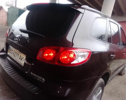 Красный Хендай Санта Фе, объемом двигателя 2.7 л и пробегом 125 тыс. км за 9700 $, фото 6 на Automoto.ua