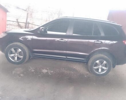 Красный Хендай Санта Фе, объемом двигателя 2.7 л и пробегом 125 тыс. км за 9700 $, фото 1 на Automoto.ua