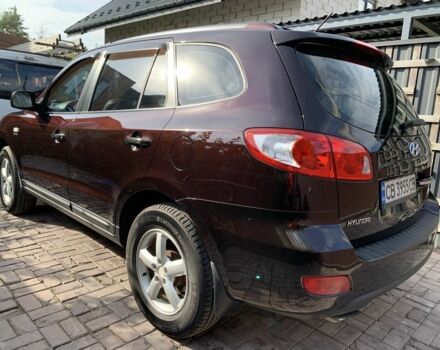 Красный Хендай Санта Фе, объемом двигателя 2.2 л и пробегом 257 тыс. км за 10000 $, фото 1 на Automoto.ua