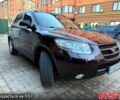 Красный Хендай Санта Фе, объемом двигателя 2.7 л и пробегом 233 тыс. км за 11000 $, фото 5 на Automoto.ua