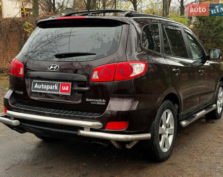Красный Хендай Санта Фе, объемом двигателя 2.2 л и пробегом 331 тыс. км за 10490 $, фото 9 на Automoto.ua
