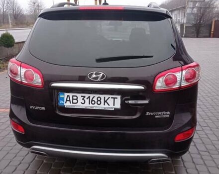 Красный Хендай Санта Фе, объемом двигателя 2.36 л и пробегом 204 тыс. км за 13600 $, фото 3 на Automoto.ua