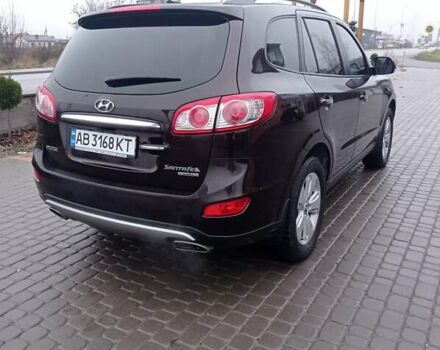 Красный Хендай Санта Фе, объемом двигателя 2.36 л и пробегом 204 тыс. км за 13600 $, фото 2 на Automoto.ua