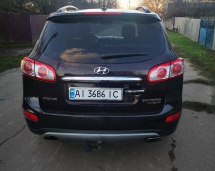 Красный Хендай Санта Фе, объемом двигателя 2.2 л и пробегом 249 тыс. км за 9999 $, фото 1 на Automoto.ua