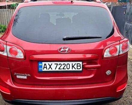 Красный Хендай Санта Фе, объемом двигателя 2.4 л и пробегом 210 тыс. км за 12000 $, фото 1 на Automoto.ua