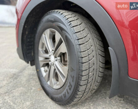 Червоний Хендай Санта Фе, об'ємом двигуна 2.4 л та пробігом 241 тис. км за 11800 $, фото 8 на Automoto.ua