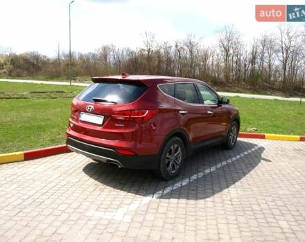 Красный Хендай Санта Фе, объемом двигателя 2.4 л и пробегом 95 тыс. км за 14999 $, фото 1 на Automoto.ua